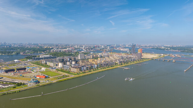 Aerial view of modern residential buildings and the IJ riverfront in Amsterdam, North Holland, Netherlands.