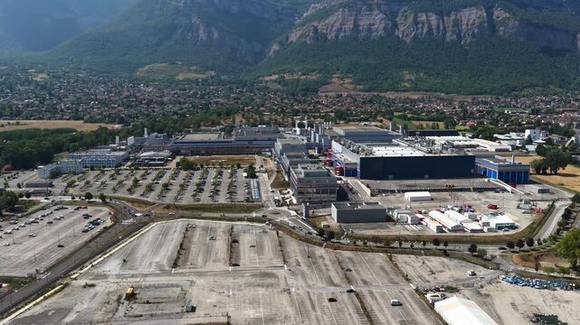 Crolles, France &ndash;  1 August 2026: Aerial panoramic view of the STMicroelectronics semiconductor manufacturing complex, a major European site for microchips, integrated circuits and silicon wafer produ
