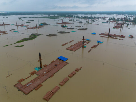 Aerial view of brick kilns submerged in floodwaters in Satkania Upazila, Chittagong Division, Bangladesh.