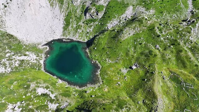 Albanian alps Jezerca lakes morning light in clear sky