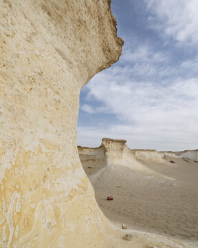 View of Zekreet Rock Formation featuring unique limestone cliffs and desert landscape in Zekreet, Al Sheehaniya Municip, Qatar.