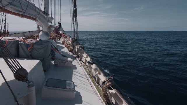 Expeditional sailing vessel moves in the open ocean