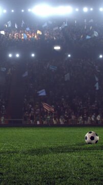 Soccer Player Walking Toward the Ball on an Empty Pitch