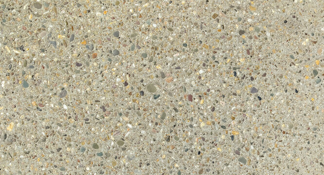 Exposed aggregate concrete surface with colorful small river stones and pebbles texture