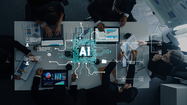 Aerial View of Business Meeting with AI Technology Integration, Multiple Laptops and Charts Overlaid with Digital Data Visualizations. Sentient.