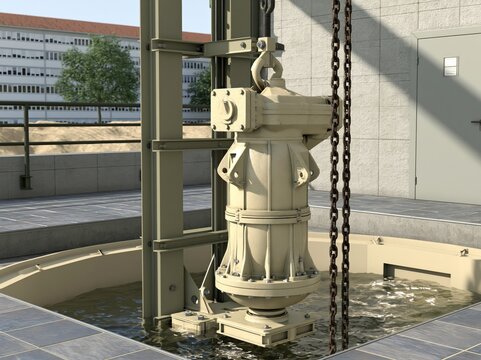 Submersible pump lifted partway out of sewage lift station in bright daylight