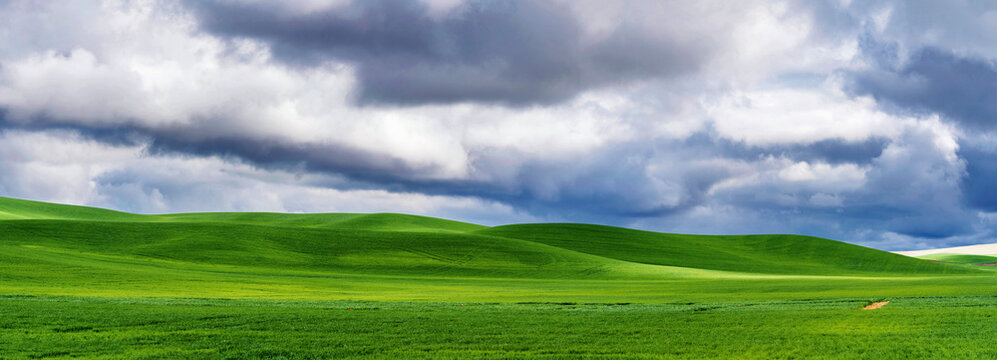 View from Vista of countryside, fields of farmland, with clouds
