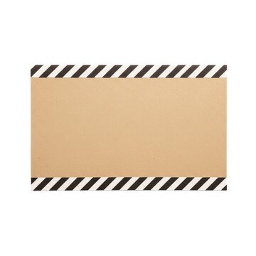 A textured brown cardboard banner featuring diagonal black and yellow hazard stripes along the top and bottom edges, ideal for warning or construction themes.