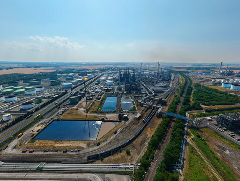 Aerial view of Humber Refinery, a large chemical plant featuring numerous storage tanks, processing units, and industrial infrastructure in South Killingholme, England, United Kingdom.