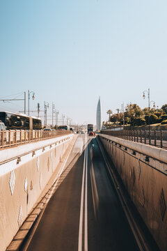 Rabat, Morocco - 14 November 2025: View of the Mohammed VI Tower rising above the urban highway with modern infrastructure and clear blue sky.