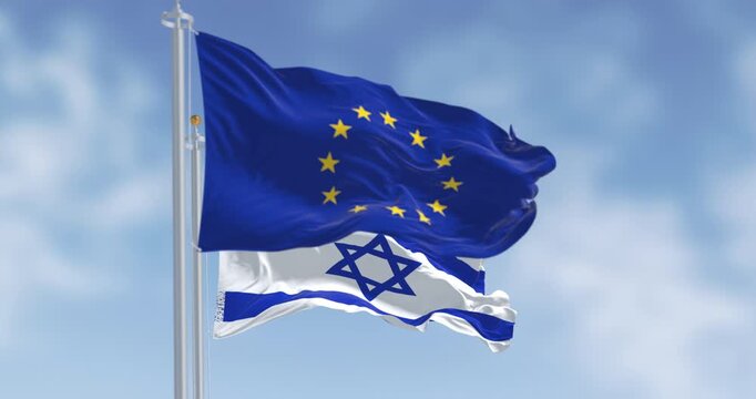 Israel national flag waving in the wind with the European Union flag