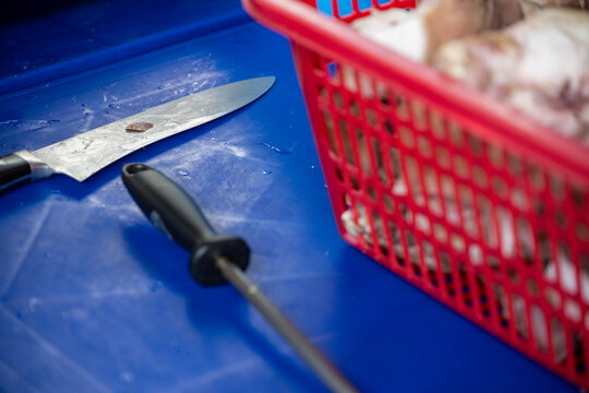 Kitchen Knife and Honing Steel Beside Pork Gukbap Ingredients at a Traditional Market Restaurant in Seoul, South Korea.