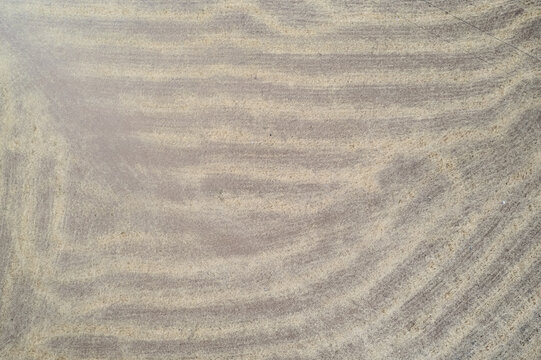 Karaman, Karaman, Turkiye - 13 September 2025: Aerial view of harvested agricultural fields showing intricate patterns left by machinery in the rural landscape.