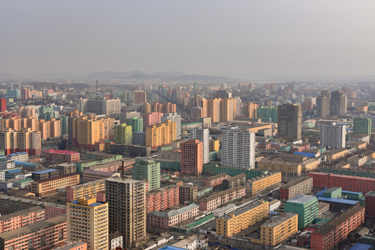 Aerial view of the colorful residential apartment buildings and urban skyline of Pyongyang, Pyongyang, North Korea.