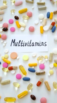 Various tablets and capsules, supplements and vitamins. Selective focus.