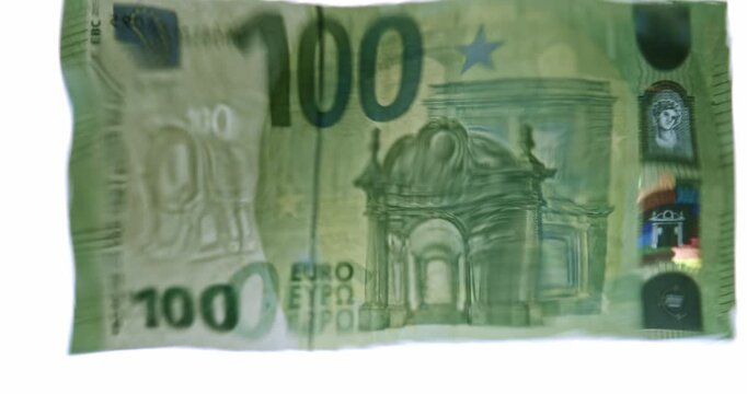 Volatility concept. Close-up studio video of a 100 Euro banknote viewed through a wavy water surface, creating a distorted and fluid appearance.