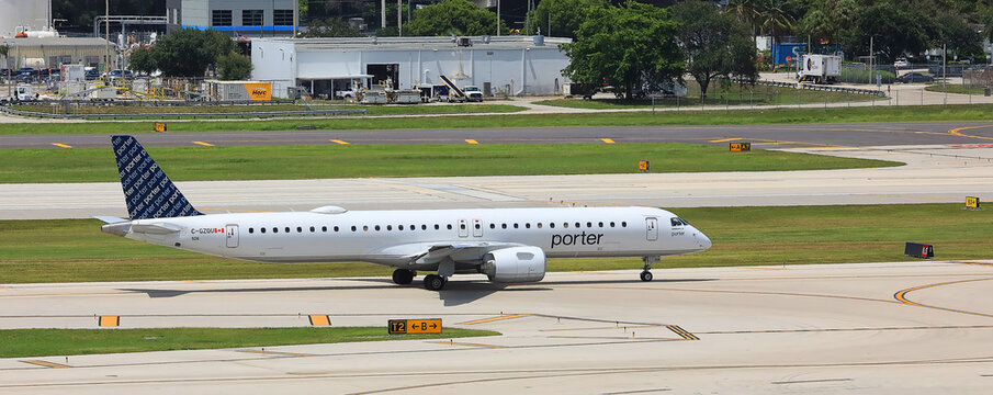 Porter Airline jet getting ready to take off for destinations in Canada.  Porter Airlines is famous for safety, free beer and wine, as seen in Fort Lauderdale, Florida, USA. 