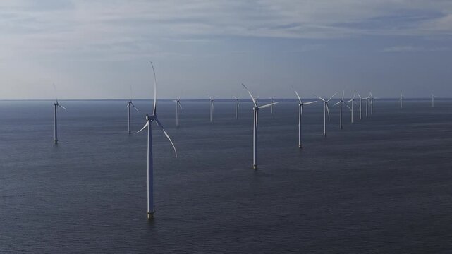Aerial view of wind turbines at Windpark Noordoostpolder in the IJsselmeer, Flevoland, Netherlands.