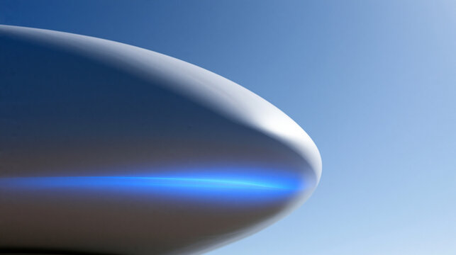 Futuristic High Speed Transport Pod Against Blue Sky