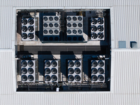 Aerial view of HVAC cooling ventilation units installed on the roof of the Six Degrees Data Centre in Studley, England, United Kingdom.
