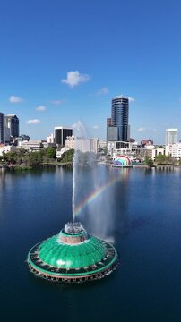Still shot of a rainbow in the fountain at Lake Eola in downtown Orlando in Orange County, Florida.