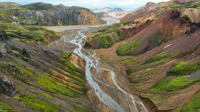 Aerial view of the colorful rhyolite mountains and braided river in Landmannalaugar, Hella, Rangarthing ytra, Iceland.