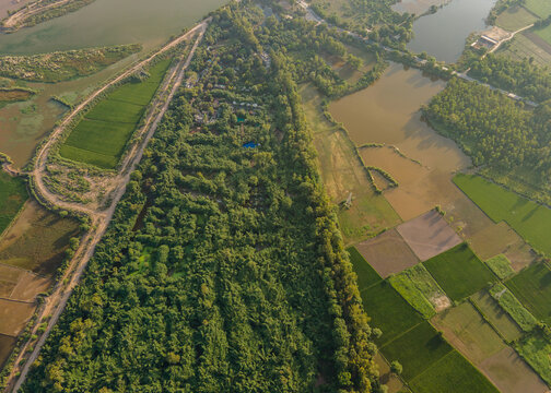 Aerial view of Rana Resort and Safari Park surrounded by lush greenery, agricultural fields, and water bodies, Phool Nagar, Punjab, Pakistan.
