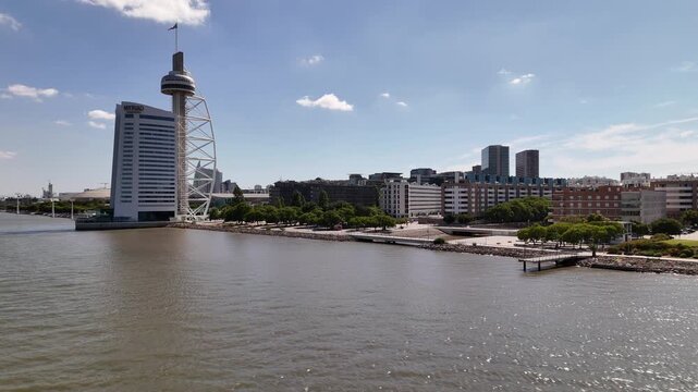 Aerial view of the modern Vasco da Gama Tower and waterfront architecture in Parque das Nacoes, Lisbon, Lisbon, Portugal.
