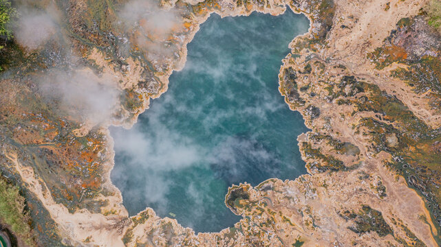 Aerial view of Sempaya Hot Springs featuring steaming geothermal water and mineral deposits in Fort Portal, Western Region, Uganda.