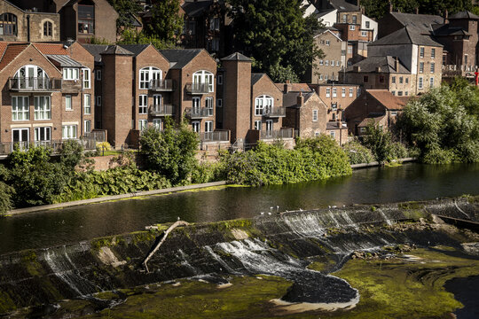 View of the River Wear and historic riverside buildings in Durham, England, United Kingdom.