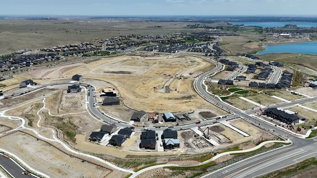 Aerial view of the Leyden residential development featuring new housing construction, winding roads, and suburban infrastructure in Jefferson County, Colorado, United States.