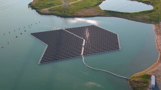 Aerial view of the floating solar farm on a lake in Bensheim, Hessen, Germany.