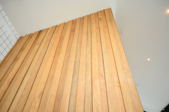 light brown wooden wall with natural wood grain texture