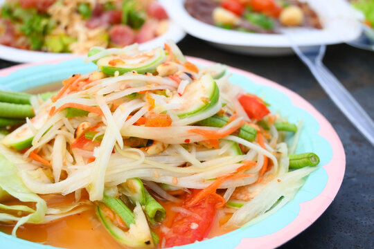 Thai green papaya salad serve in bowl, Thai cusine and healthy eating