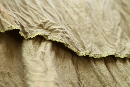 Wrinkled Beige Crinkled Fabric Texture Background Close Up