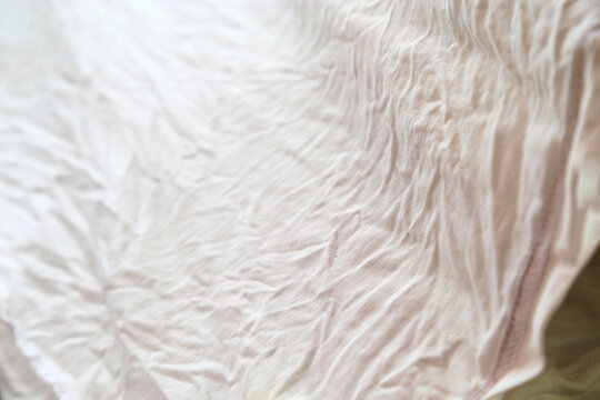 Soft Pinkish White Crinkled Fabric Texture Background