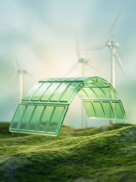 Modern glass greenhouse with arched design in a lush field with wind turbines in the background.