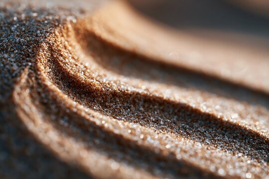 Close up of golden sand surface waves with fine sand grains