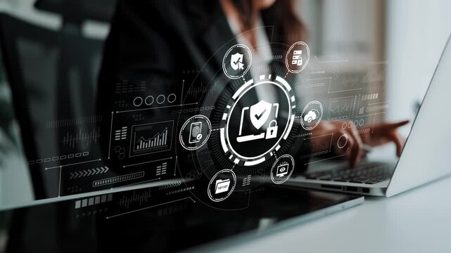 Business professional using digital technology to enhance security measures in the workplace environment with data protection concepts shown in background. Entropy.