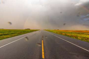 Obraz premium Rainbow After the Storm. Climate Change, Extreme Weather, Supercell Storms, Environmental Sustainability and Hope for a Changing Planet