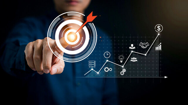 Businessman touching virtual target dartboard with growth chart for business targeting strategy and marketing goal achievement concept