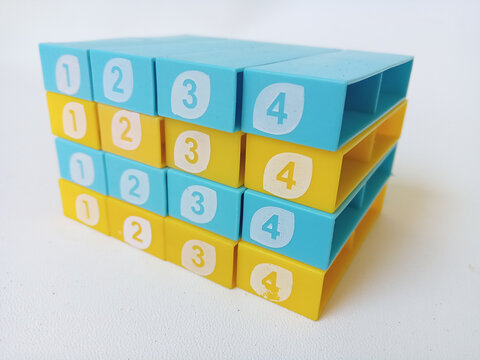 Colorful numbered toy blocks stacked in order