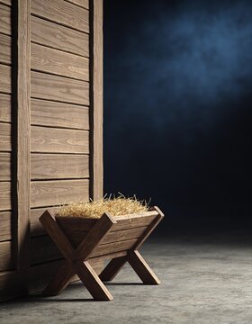 Photography of an empty wooden manger filled with soft hay against a dark night copy space
