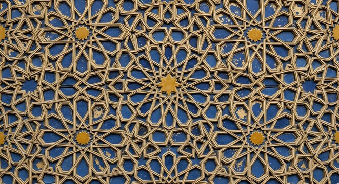 Intricate Islamic geometric tile work with a complex star pattern and vibrant blue background.