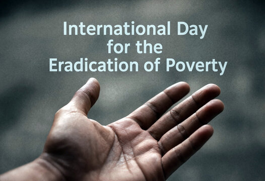 Open hand reaching out with text international day for the eradication of poverty concept