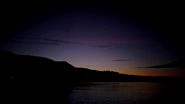 Sunrise timelapse showing sky changing colors over Adriatic sea, mountains, and Split city coast in Croatia. Concept for travel destination, Mediterranean landscape, and new day.