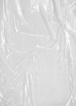 White crumpled plastic bag texture background. Clear cellophane wrap overlay effect for graphic design mockup.