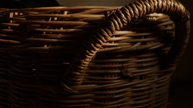 Woven Rattan Wicker Texture with Warm Sunlight, Close-Up Natural Basket Weave Pattern