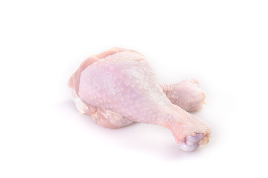 Fresh Raw Chicken Legs and Thighs Isolated on White Background