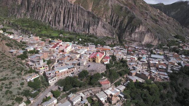 4K drone aerial view of Iruya, Salta, Argentina. A remote Andean village surrounded by dramatic mountains, deep valleys and winding roads in one of the most spectacular landscapes of northern Argentin